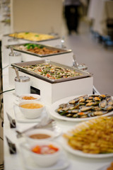 buffet food, catering food party at restaurant, mini canapes, snacks and appetizers