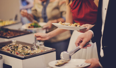 buffet food, catering food party at restaurant, mini canapes, snacks and appetizers