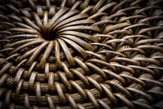 Close up, isolated sunlit view of woven basket