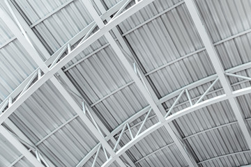 industrial corrugated metal ceiling structure with metal truss frame