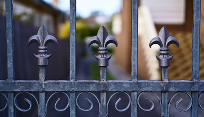 Grey fence with weapon lookalike elements