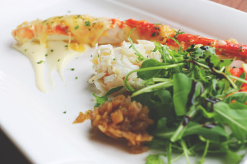 delicious Alaska crab on white plate