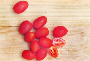 Cherry Plum Tomatoes on a Wooden Board