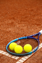 Tennis racket and balls