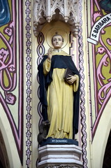 The interior of the Roman Catholic Holy Name Cathedral. Mumbai (Bombay), India. Sculpture of St. Dominic 