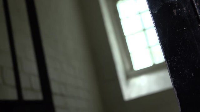 Prison window jail cell door slams shut