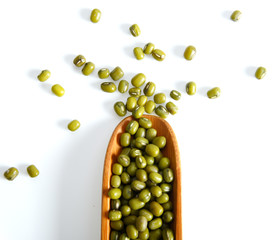 Mung bean in spoon on white background