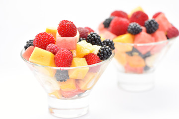 Dessert on the table. Sliced fruit.