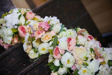 The composition is made by florists from fresh flowers.