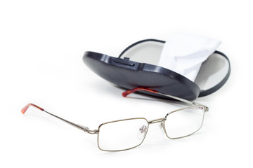 Men's eyeglasses against of spectacle-case at selective focus