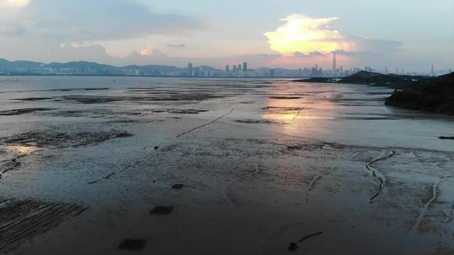 sunset pak nai/ lau fau shan mudflat in hong kong