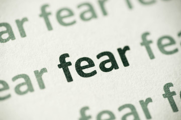 word fear printed on paper macro