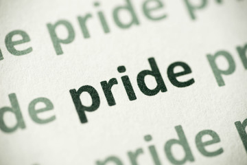word pride  printed on paper macro