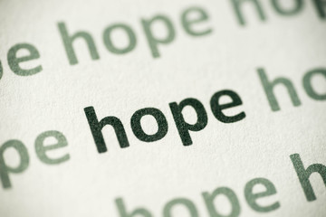 word hope printed on paper macro