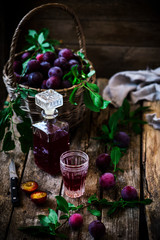 plum liqueur.style vintage. selective focus
