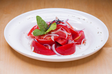 Salad with tomato and onion appetizer