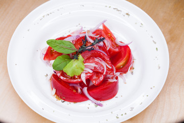 Salad with tomato and onion appetizer