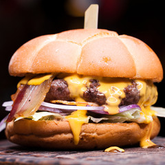 Big cheeseburger with melted cheese