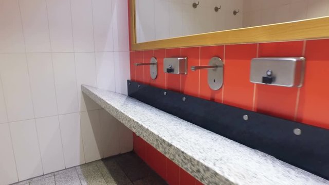 public wash basin with sinks modern interior