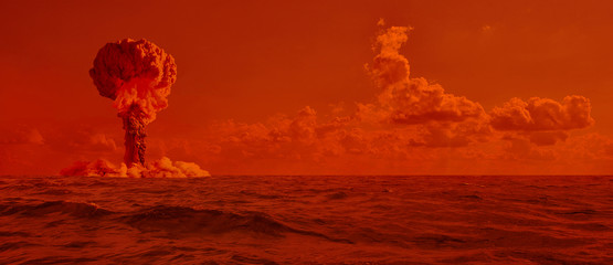 Explosion of a nuclear bomb in the ocean.