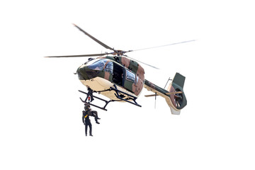 Rayong, Thailand - July 21 2018:the men lowered by a rope under a helicopter on the white background.