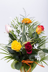 Bouquet of assorted multicolored roses isolated on white background
