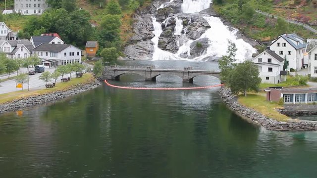 Settlement, gulf, bridge and falls. Hellesylt, Norway