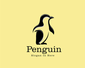 walking penguin animal logo vector