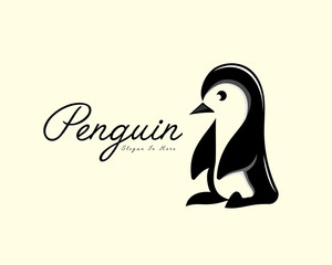 Obraz premium stand penguin art logo vector