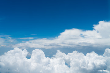 Naklejka na ściany i meble beautiful blue sky with cloud.Blue sky with clouds for background.Skyline View above the Clouds from air plane