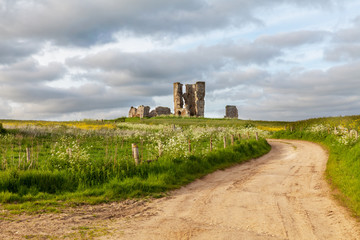 Winding road leading to a chirch ruin in Norfolk