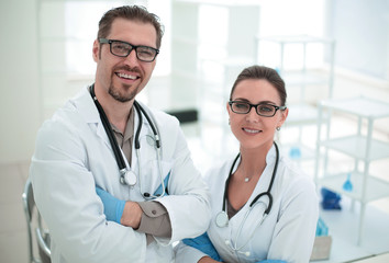Fototapeta premium two researchers on the background of the laboratory