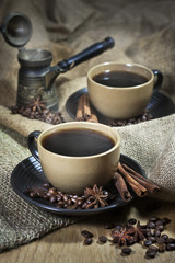 Two cups of coffee with spices