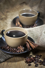 Two cups of coffee with spices