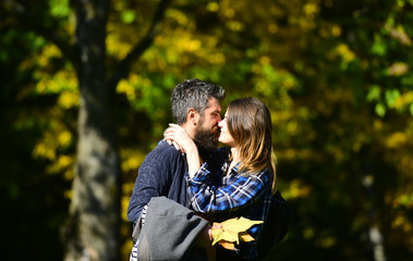 Fototapeta premium Couple in love walks in autumn park. Relationship and fall