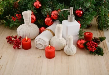 Foto auf Acrylglas Spa treatment with Christmas decorations on wooden background  © Mee Ting