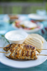 Delicious grilled chicken souvlaki, traditional Greek dish.