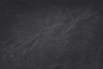Obraz premium Dark grey black slate texture in natural pattern with high resolution for background and design art work. Black stone wall.