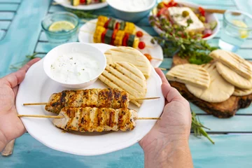  Delicious grilled chicken souvlaki, traditional Greek dish. © iMarzi