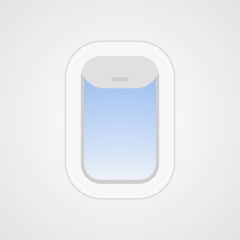 Airplane window with sky