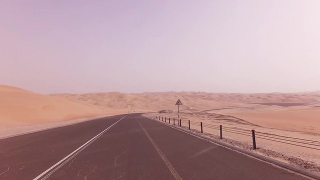 New road from Oasis Liwa to Moreeb Dune in Rub al Khali desert stock footage video