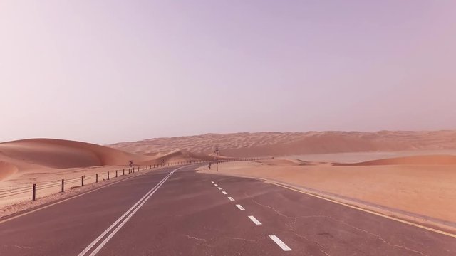 New road from Oasis Liwa to Moreeb Dune in Rub al Khali desert stock footage video