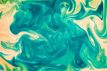 Fototapeta na wymiar Abstract colors, backgrounds and textures. Food Coloring in milk. Food coloring in milk creating bright colorful abstract backgrounds. Colorful chemical experiment