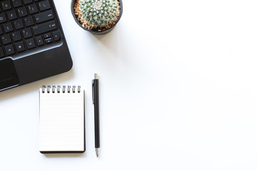 white office table with office supplies