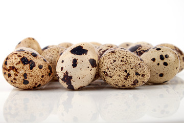 Obraz premium Quail egg on a white background