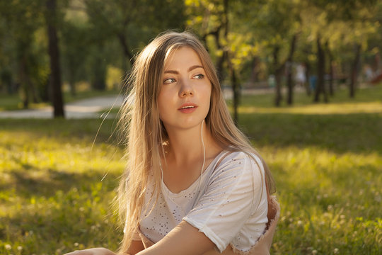 young beautiful girl, blond, portrait, face beautiful blonde, girl in sunset light