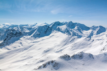 Fototapeta na wymiar Winter snow covered mountain peaks Austrian alps