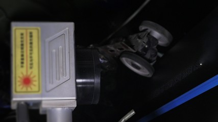 Laser Marking Machine Engraving. Manufacture of plastic water pipes of the factory. Process of making plastic tubes on the machine tool with the use of water and air pressure.