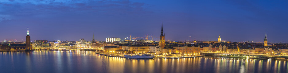 Stockholm panorama night city skyline at Stockholm City Hall and Gamla Stan, Stockholm Sweden