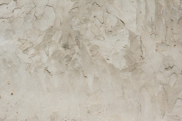 Wall fragment with scratches and cracks